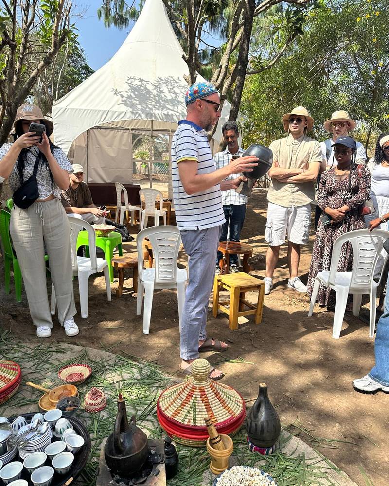 Guests at a traditional Ethiopian coffee ceremony on the farm